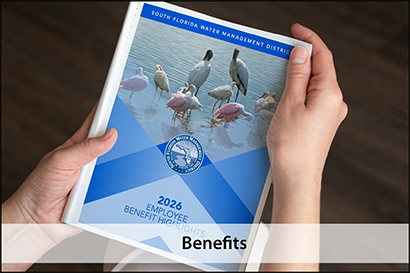 Man holding a benefits booklet