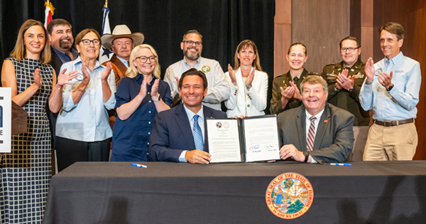 Governor Ron DeSantis signing a landmark Agreement with U.S. Department of the Army 